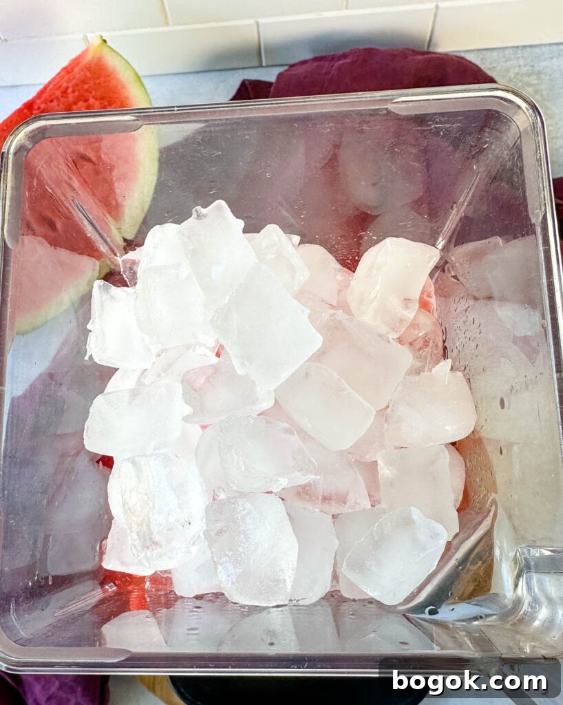 Frozen Watermelon Margarita Recipe for Summer 6 frozen watermelon margaritas in a blender with ice
