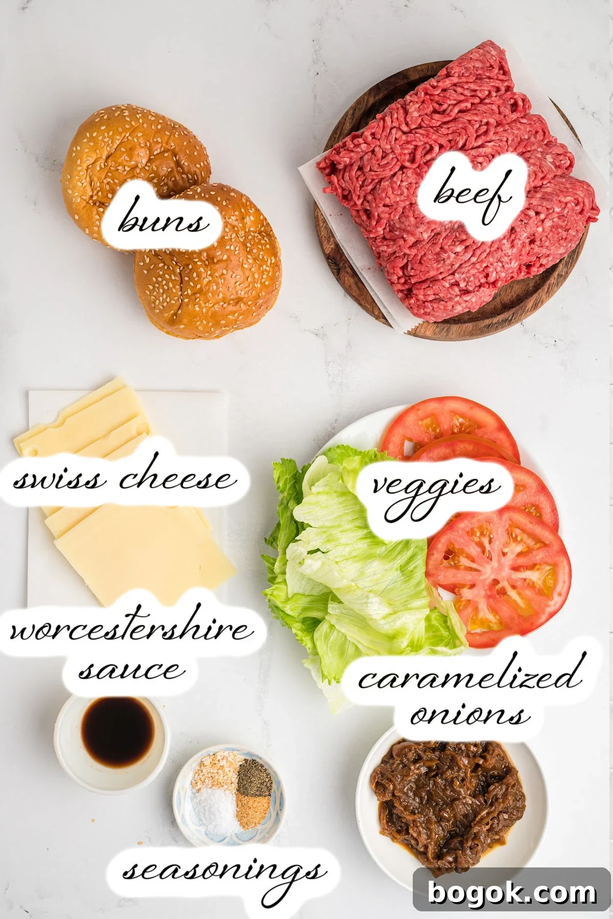 Juicy Cast Iron Skillet Burgers That Beat the Grill 3 ingredients laid out on marble counter.