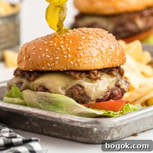 Juicy Cast Iron Skillet Burgers That Beat the Grill 9 tray of burger and fries.