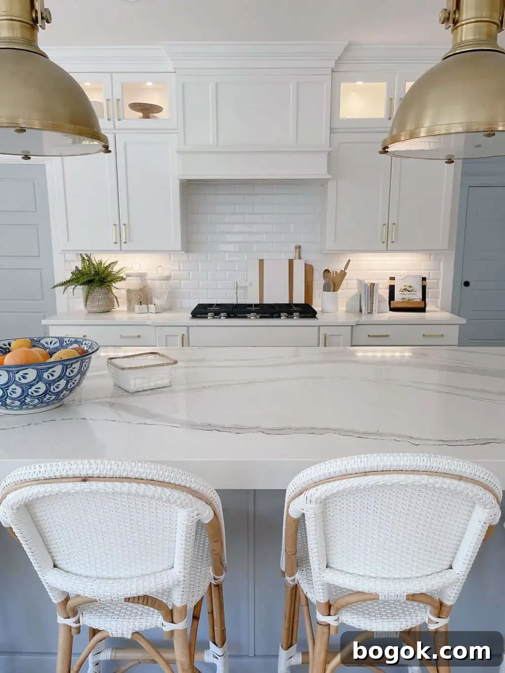 White Kitchen with Blue Island: Design Details 2 beveled subway tile in a blue and white kitchen