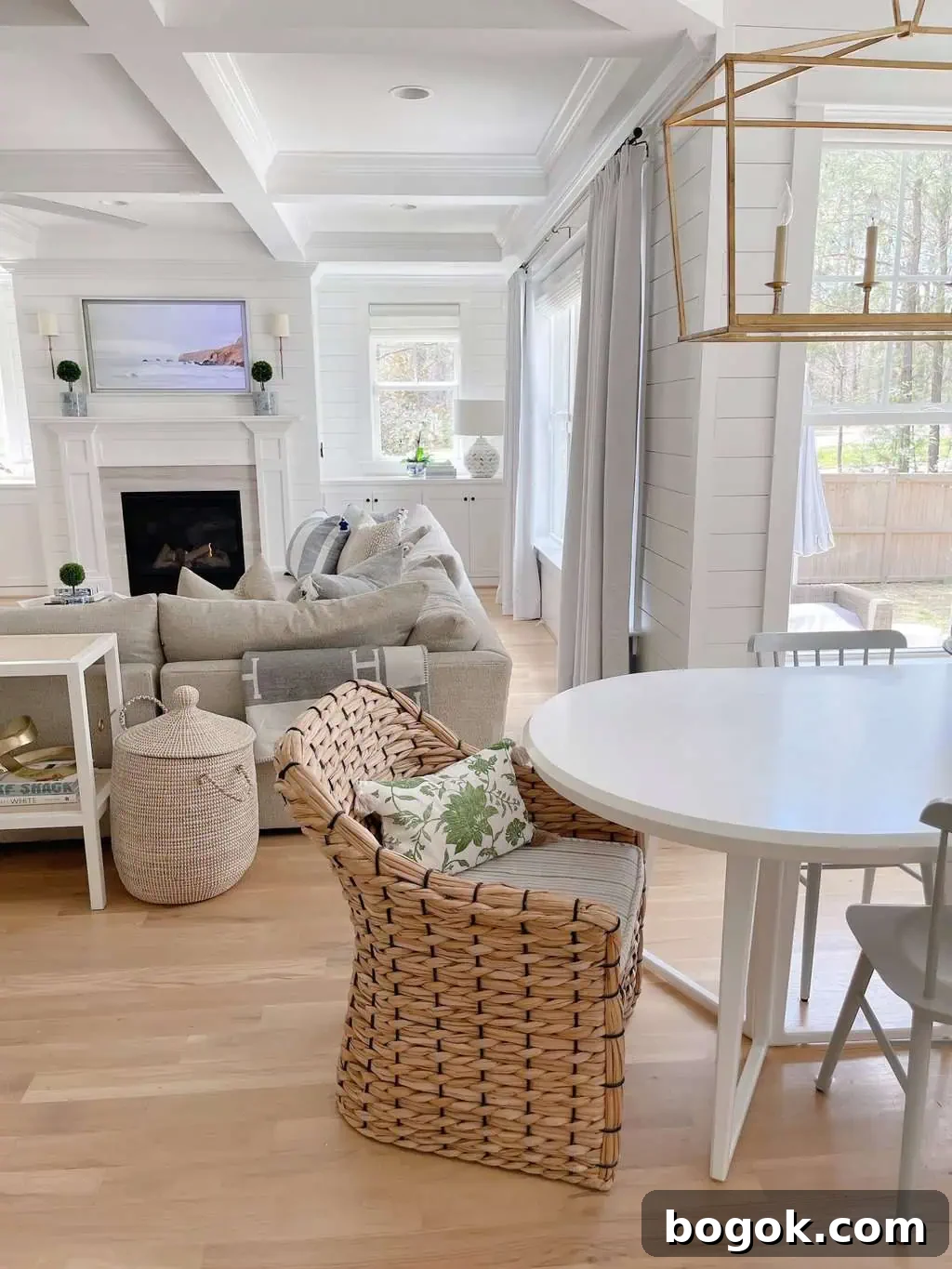 White Kitchen with Blue Island: Design Details 8 a white kitchen woven end chairs