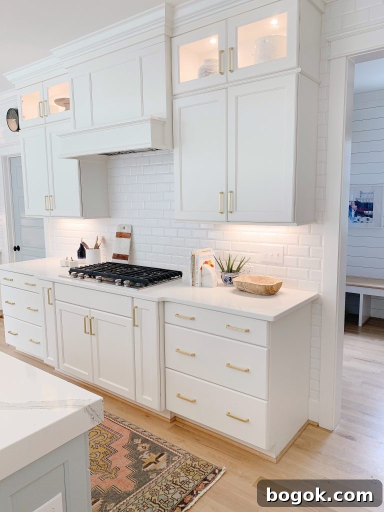 White Kitchen with Blue Island: Design Details 6 a vintage runner in a white kitchen