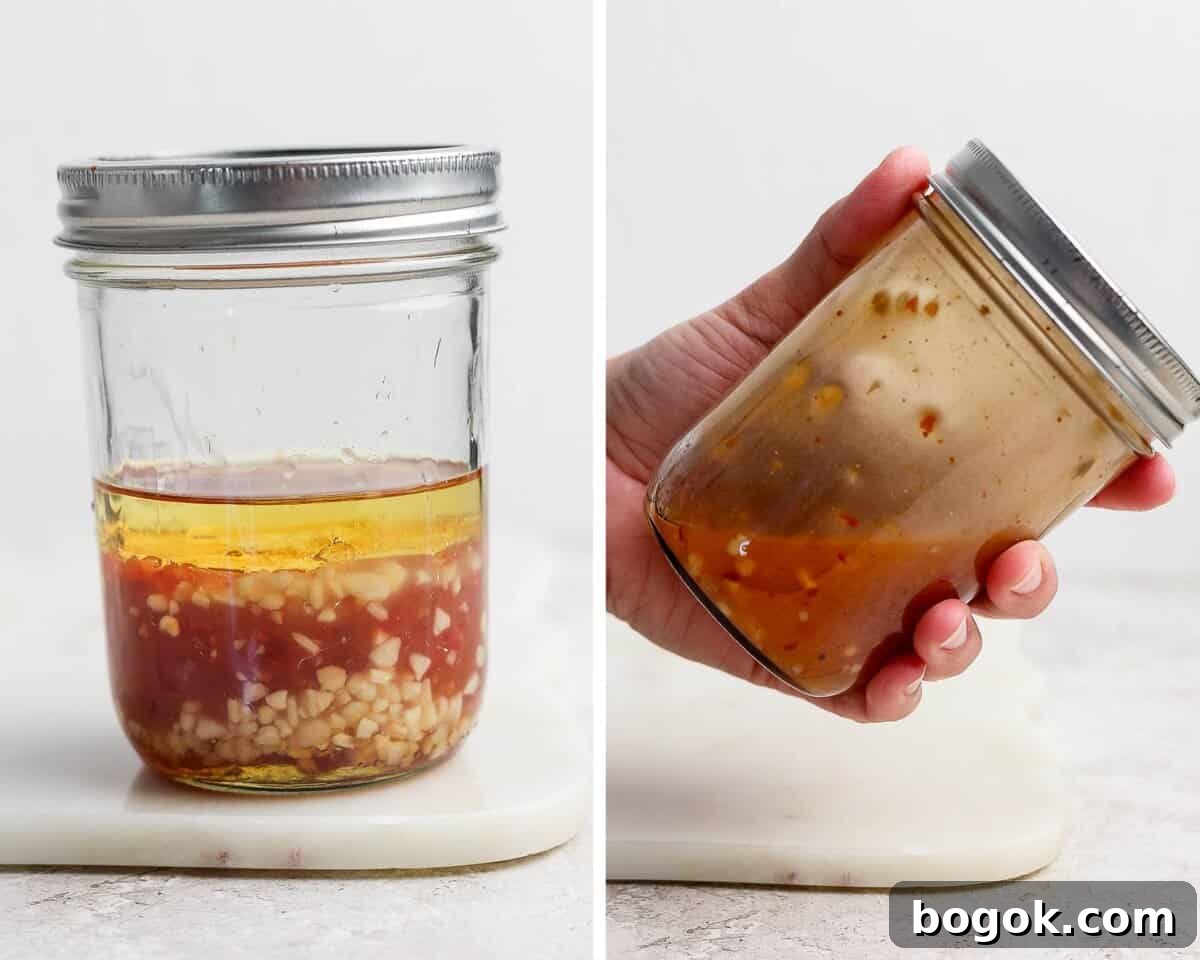 Sweet Chili Vinaigrette for Salads and Marinades 4 A mason jar with the salad dressing ingredients being shaked.
