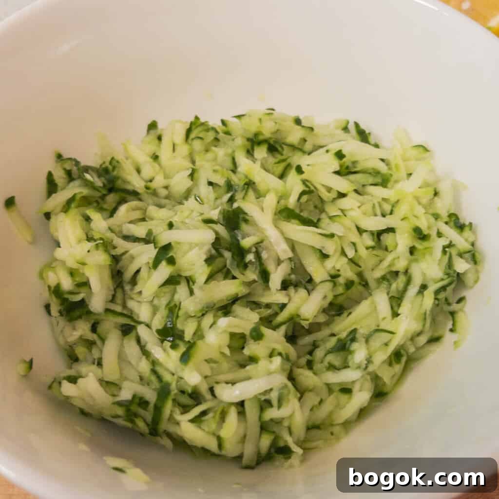 Authentic Greek Tzatziki Sauce Recipe 4 Step 1 Grate the cucumber using a food processor or standard grater