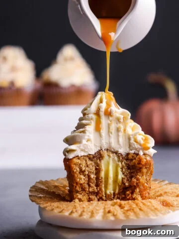 Pouring caramel syrup over hazelnut cupcake