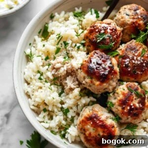 Greek-Style Chicken Meatballs with Lemon & Oregano 7 Greek chicken meatballs with feta and rice.